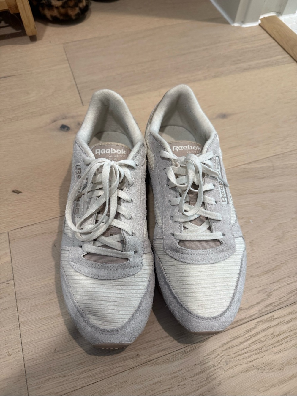 Reebok low-top sneakers in light gray and cream